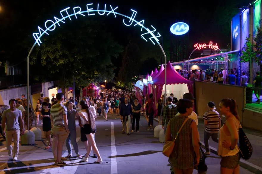 Jazz musicians performing by Lake Geneva during Montreux Jazz Festival in Switzerland.