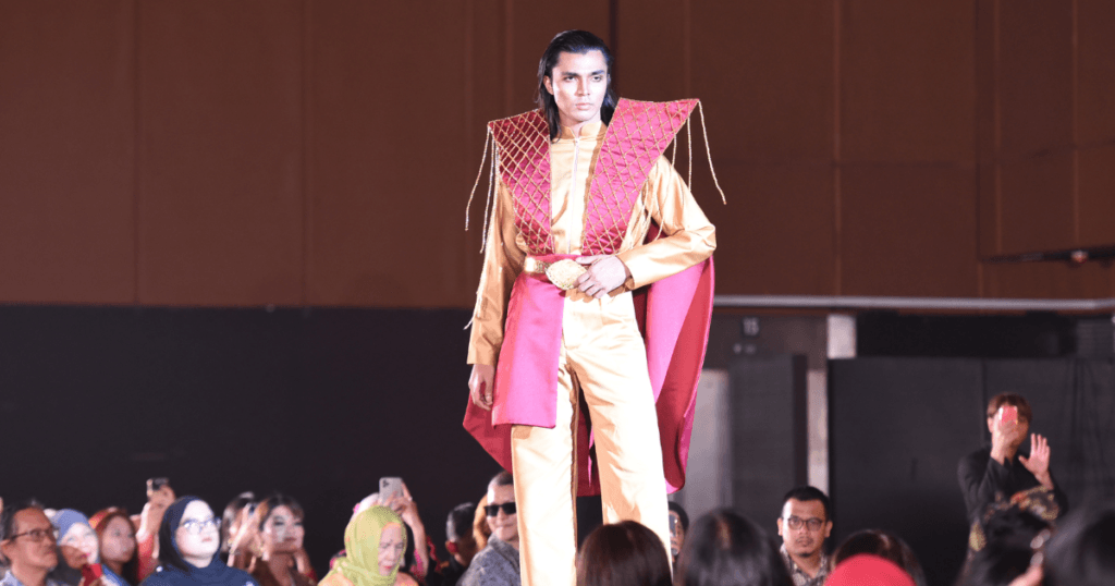 Models walking at Modest Fashion Week wearing modern modest designs.