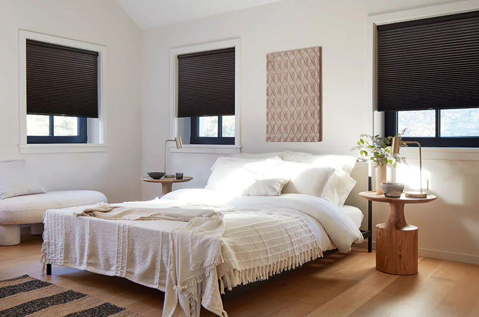 Floor-to-ceiling velvet curtains in a modern luxury bedroom.