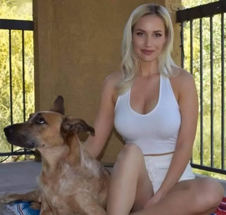 Paige Spiranac taking a selfie while promoting golf content on Instagram.