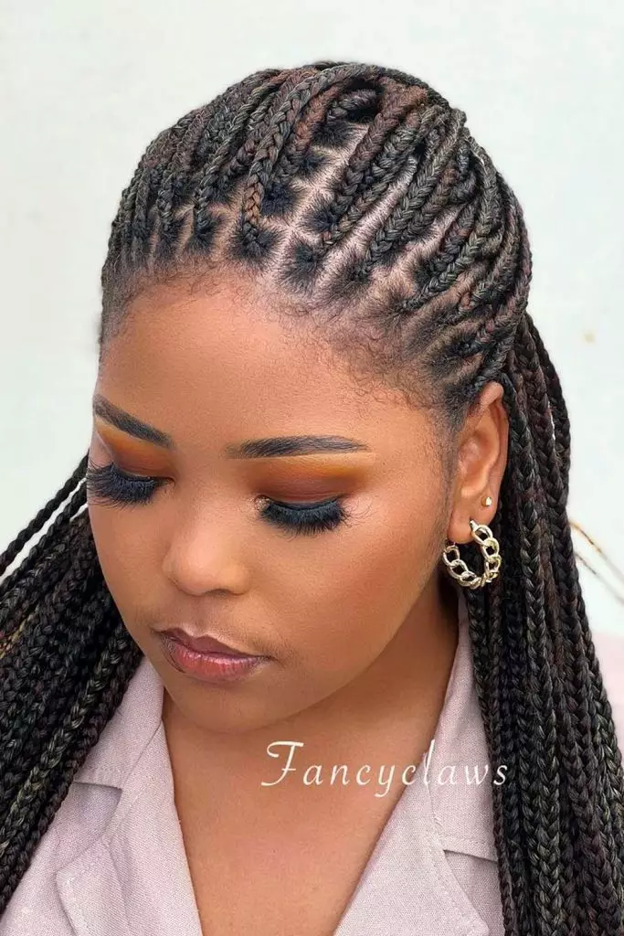 Athlete-inspired boxer braids hairstyle perfect for humid outdoor summer days — Best Hairstyles to Beat Summer Humidity.