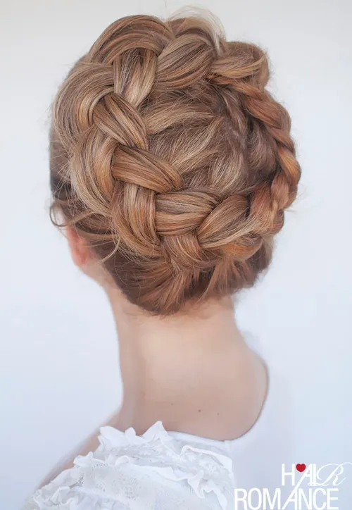 Model with a braided crown hairstyle that stays neat and frizz-free during humid summer days — Best Hairstyles to Beat Summer Humidity.