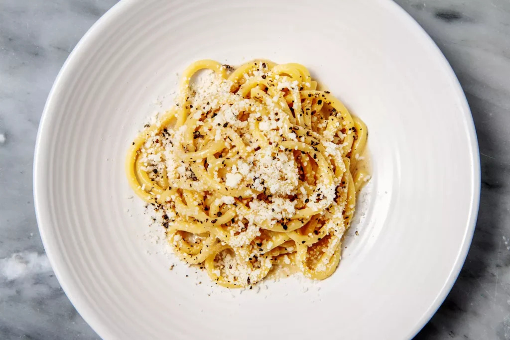 “Simple Roman pasta cacio e pepe with Pecorino Romano cheese and black pepper – quick and easy Italian pasta dish to make at home.”