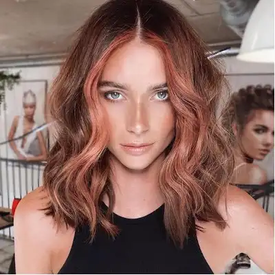 "Contrast between outdated chunky highlights and soft babylights on healthy hair."
