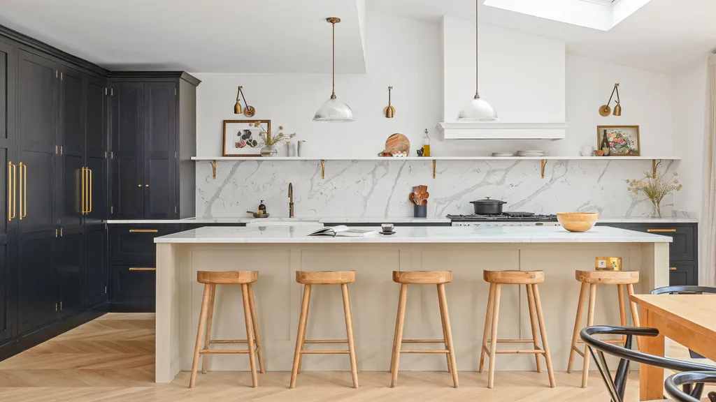 “White farmhouse-style sink with a linen skirt and black matte faucet surrounded by rustic countertops.