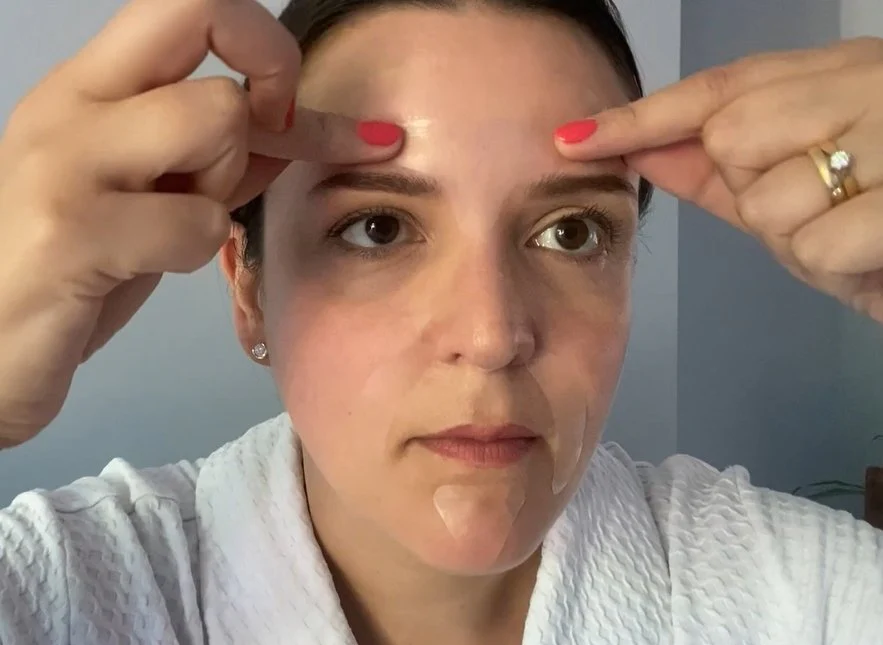 “Facial exercise to smooth forehead wrinkles naturally.”