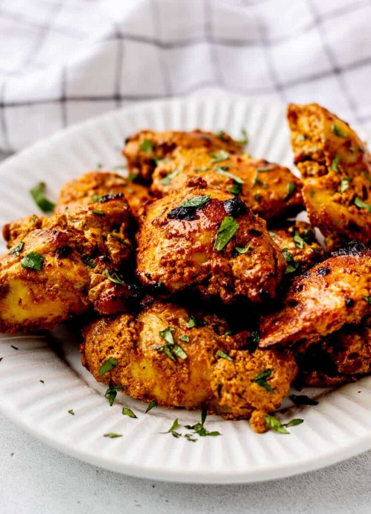 Creamy Greek yogurt chicken curry with spinach served over rice.”