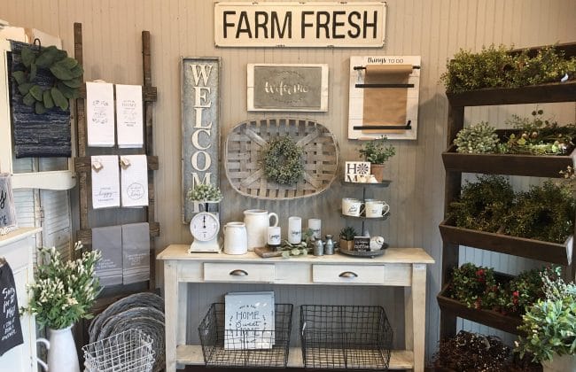 “Thrift store finds for farmhouse kitchen décor including baskets, jars, and reclaimed wood accents.”