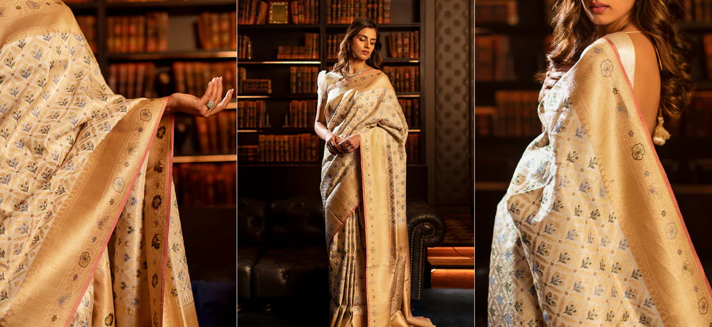 Woman wearing a classic Nivi-style sari in silk with a high-neck blouse and pleated pallu pinned with a designer brooch.