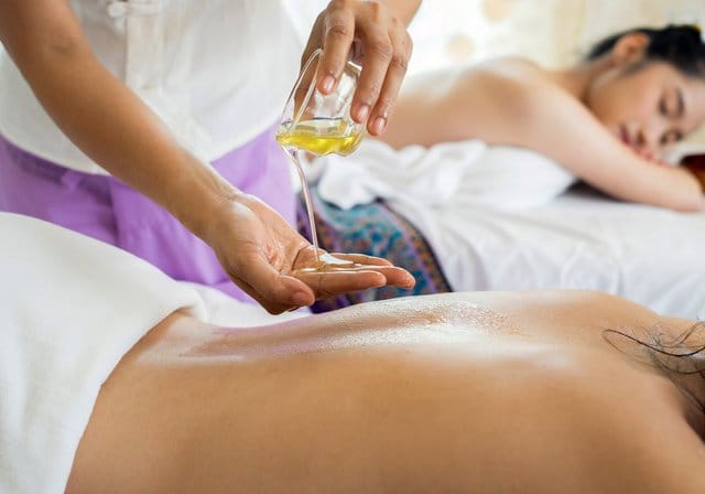 “Spa-like setting with body mask, dry brush, and massage roller for self-care.”