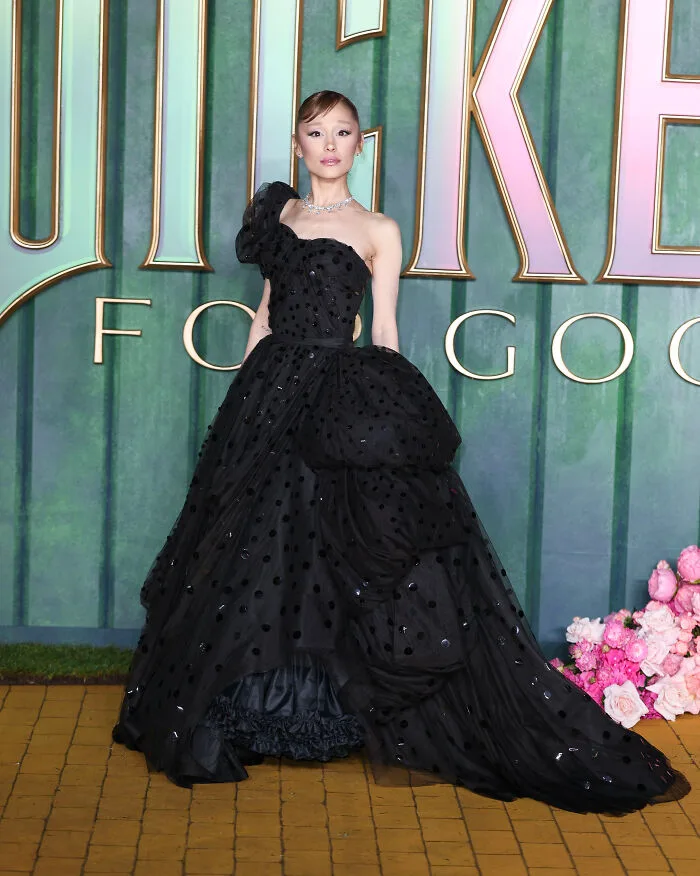 Ariana Grande in a vintage 1952 Gilbert Adrian one-shoulder princess gown at the Wicked: For Good London premiere.