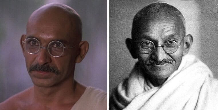 “Ben Kingsley dressed as Mahatma Gandhi with glasses and traditional clothing next to the real Gandhi.”