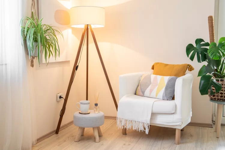 “Bedroom with fairy lights, bedside lamps, and dim warm lighting for a romantic atmosphere.”