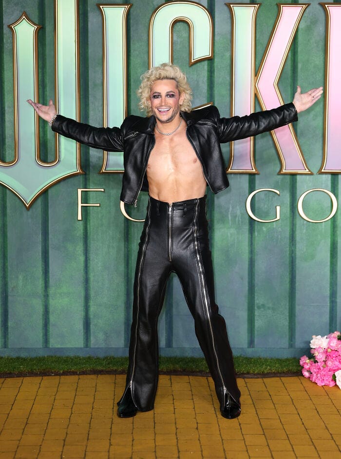 Frankie Grande shirtless in a black leather jacket and pants at the Wicked: For Good premiere in London.