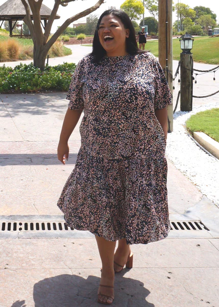 Flowy plus size day dress styled for casual daytime activities