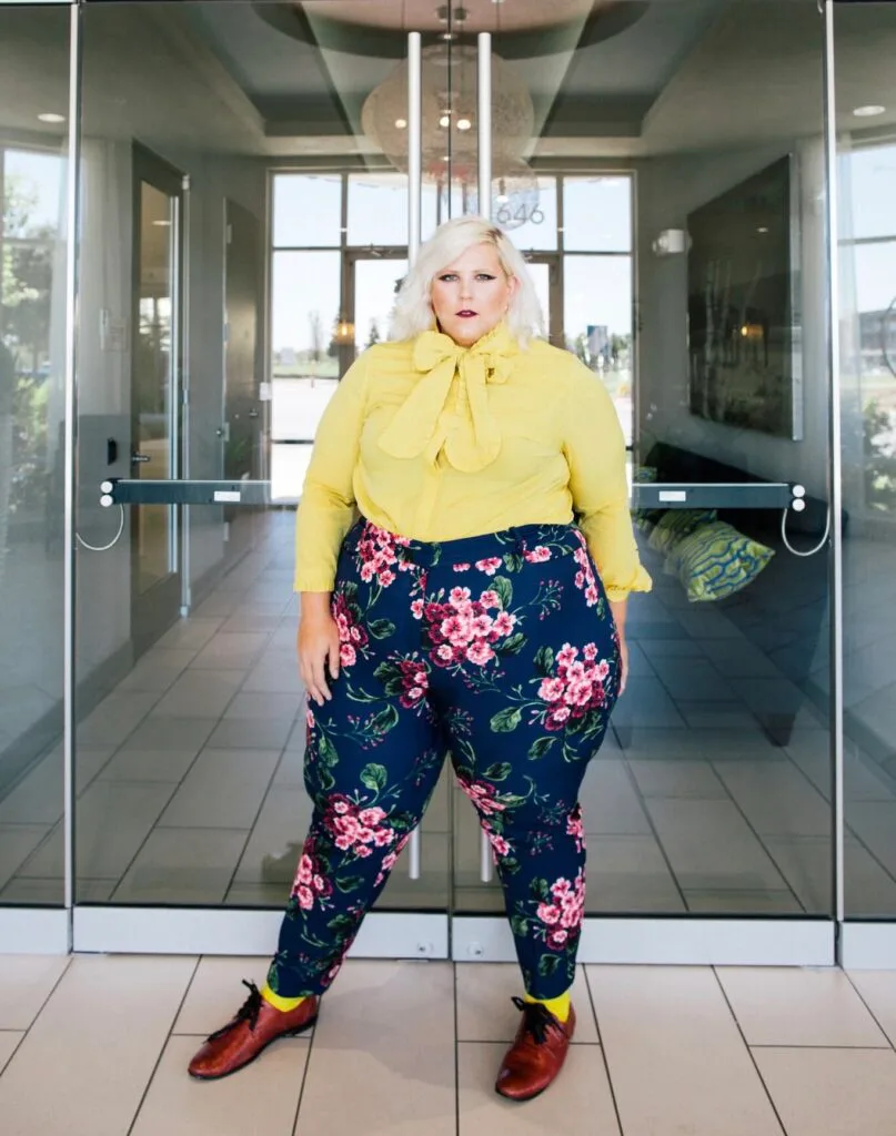 Plus size woman wearing a comfortable and polished office outfit