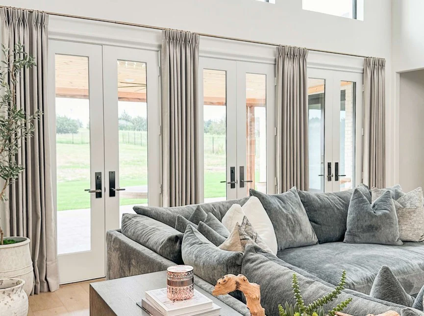 Beige and gray neutral curtains blending seamlessly with modern living room décor.