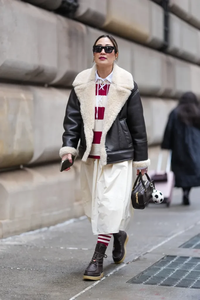 “Preppy rugby shirt styled with casual winter layers for a sporty December outfit.”